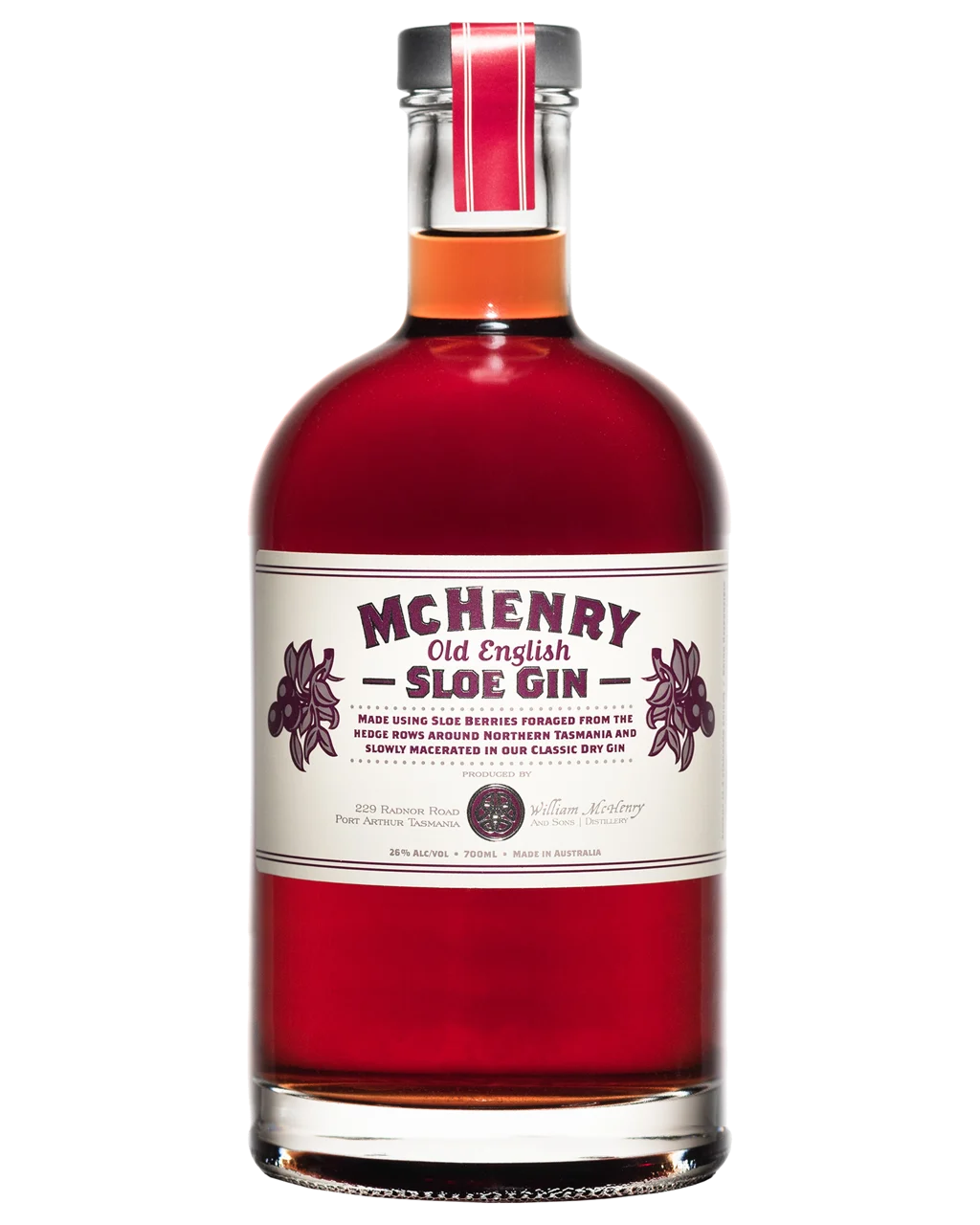 Bottle of McHenry Old English Sloe Gin on a white background